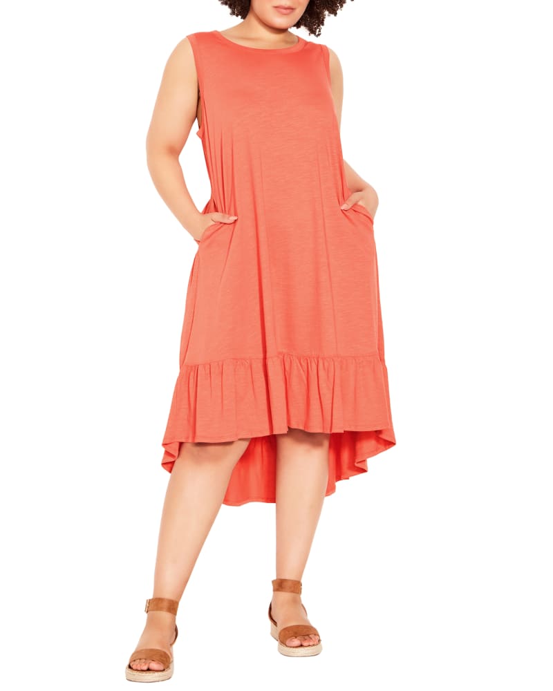 Front of a model wearing a size 14 Evie Ruffle Dress in Coral by Zim & Zoe. | dia_product_style_image_id:201318